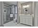 Modern bathroom features a glass-enclosed shower and a vanity with ample storage space at 100 Spincast Ct, Peachtree City, GA 30269