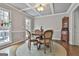 Bright dining area with door to outside and view to the backyard at 100 Spincast Ct, Peachtree City, GA 30269