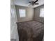 Bedroom featuring neutral walls, carpet floors, natural lighting and ceiling fan at 3401 Longleaf Dr, Decatur, GA 30032