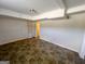 Spacious basement area with vinyl flooring and neutral walls, ready for customization at 128 Sewanee Nw Ave, Atlanta, GA 30314