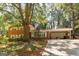 Beautiful brick home featuring a covered carport and well-maintained lawn at 1387 John Robert Dr, Morrow, GA 30260