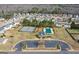 Community shot featuring pool, tennis court and parking at 704 Davenport Ct, Stockbridge, GA 30281