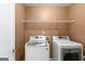 Efficient laundry room featuring a modern washer and dryer set at 704 Davenport Ct, Stockbridge, GA 30281