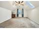 Bedroom featuring white walls, carpet, a ceiling fan, and a skylight at 642 Grecken Grn, Peachtree City, GA 30269