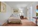 Cozy bedroom featuring carpet flooring, a neutral color scheme, and bright natural light at 4226 Highway 155 N, Stockbridge, GA 30281
