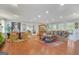 Spacious living room with hardwood floors, comfortable seating, and abundant natural light at 4226 Highway 155 N, Stockbridge, GA 30281