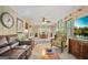 Bright living room with a ceiling fan and a view to the outdoors at 4226 Highway 155 N, Stockbridge, GA 30281