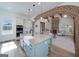 Modern kitchen with stone countertops, a farmhouse sink, and stainless steel appliances at 271 Trestle Rd, Locust Grove, GA 30248