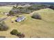 Aerial view of home surrounded by 11.86 acres of land at 271 Trestle Rd, Locust Grove, GA 30248