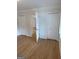 Bright bedroom features hardwood floors, closet space, and natural light at 2577 Headland Dr, East Point, GA 30344