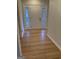 Entry foyer featuring a decorative front door with glass sidelights and hardwood floors at 2577 Headland Dr, East Point, GA 30344