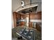 Kitchen featuring a large island with gas range and stainless steel appliances at 2577 Headland Dr, East Point, GA 30344