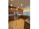 Well lit kitchen with stainless steel appliances, granite countertops and wooden cabinets at 2577 Headland Dr, East Point, GA 30344