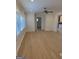 Spacious living room with hardwood floors, ceiling fan, and natural light at 2577 Headland Dr, East Point, GA 30344