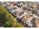 Aerial view of the residential neighborhood showcasing the rooftops and mature trees surrounding the homes at 2391 Wellborn Hills Ct, Lithonia, GA 30058