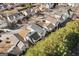 Aerial view of the residential neighborhood showcasing the roof and mature trees surrounding the houses at 2391 Wellborn Hills Ct, Lithonia, GA 30058