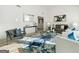 Stylishly decorated living room with modern furnishings, wood floors, and an open layout perfect for entertaining at 2391 Wellborn Hills Ct, Lithonia, GA 30058