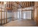 Exposed garage interior with visible framing and multiple garage doors at 3822 Holland Dr, Snellville, GA 30039