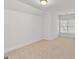 Well-lit bedroom featuring carpet flooring and a window with natural light at 6275 Glen Oaks Ln, Atlanta, GA 30328