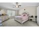 Bedroom with large windows, ceiling fan and light colored furniture at 4282 South Hwy 29, Moreland, GA 30259