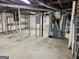 Unfinished basement with exposed ceiling, concrete floor, and essential utilities, ready for customization at 5535 Beaver Sw Dr, Mableton, GA 30126