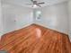 Spacious bedroom features hardwood floors, ceiling fan, and ample natural light at 2117 Keheley Dr, Decatur, GA 30032