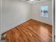 Cozy bedroom with hardwood floors, a ceiling fan, and a window for natural light at 2117 Keheley Dr, Decatur, GA 30032