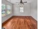 Cozy bedroom with hardwood floors and an abundance of natural light from the windows at 2117 Keheley Dr, Decatur, GA 30032