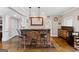 Basement bar features custom cabinetry, granite countertops, and bar seating at 160 Allie Dr, Mcdonough, GA 30252