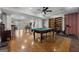 Spacious finished basement with pool table, seating and workout area at 160 Allie Dr, Mcdonough, GA 30252