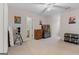 Spacious bonus room with carpet, ceiling fan, and bathroom access at 160 Allie Dr, Mcdonough, GA 30252