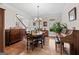 Traditional dining room with hardwood floors and detailed wood trim at 160 Allie Dr, Mcdonough, GA 30252