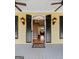Inviting front entrance with black shutters, vintage lighting, and a glimpse of the staircase at 160 Allie Dr, Mcdonough, GA 30252