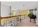 Second-floor landing with carpet, a hallway, and a view of the living room at 160 Allie Dr, Mcdonough, GA 30252