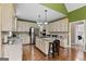 Spacious kitchen with a center island, granite countertops, and stainless steel appliances at 160 Allie Dr, Mcdonough, GA 30252