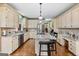 Spacious kitchen with a center island, granite countertops, and stainless steel appliances at 160 Allie Dr, Mcdonough, GA 30252