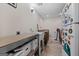 Finished basement laundry room with utility sink, counters, and storage space at 160 Allie Dr, Mcdonough, GA 30252