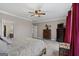 Comfortable bedroom showing carpet, a ceiling fan, and furniture at 160 Allie Dr, Mcdonough, GA 30252