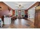 Home office with decorative slate floors, ceiling fan, and a desk with storage at 160 Allie Dr, Mcdonough, GA 30252