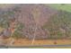 Aerial view of a wooded property, showcasing its expansive land and natural surroundings at 630 Stoney Point Rd, Bowdon, GA 30108