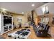 Spacious living room with a unique fireplace, hardwood floors, and ample natural light at 630 Stoney Point Rd, Bowdon, GA 30108