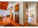 Hallway showcasing wood floors with access to kitchen, living room, and breakfast nook at 2191 Spear Point Dr, Marietta, GA 30062