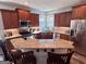 Well-equipped kitchen with stainless steel appliances, granite countertops, and a breakfast bar at 175 Monarch Dr, Peachtree City, GA 30269