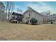 View of the home's screened in porch and upper deck at 40 High St, Sharpsburg, GA 30277