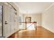 Elegant foyer featuring hardwood floors, a chandelier, and decorative mirror at 40 High St, Sharpsburg, GA 30277