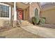 Elegant front entrance showcasing stone accents and a vibrant red front door at 40 High St, Sharpsburg, GA 30277