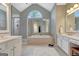 Bright bathroom featuring a shower, bath tub, double vanity and bright lighting at 120 Middleton Dr, Peachtree City, GA 30269