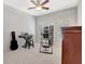 Bedroom with a guitar, keyboard, and shuttered windows at 120 Middleton Dr, Peachtree City, GA 30269