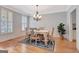 Charming dining room with classic chandelier and natural light at 120 Middleton Dr, Peachtree City, GA 30269