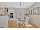 Bright eat in area with seating for four, view to modern kitchen with stainless steel appliances at 120 Middleton Dr, Peachtree City, GA 30269